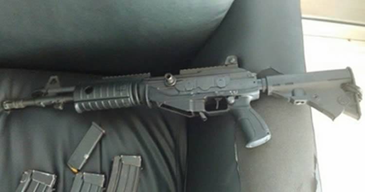 Fusil usado en asalto al Banco Popular pertenece a la Policía de Haití